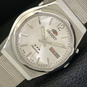 Vintage 1979 Orient Automatic Mens Silver Watch W/daydate & Red accents